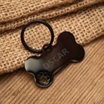 Black Bone Paw Print Tag